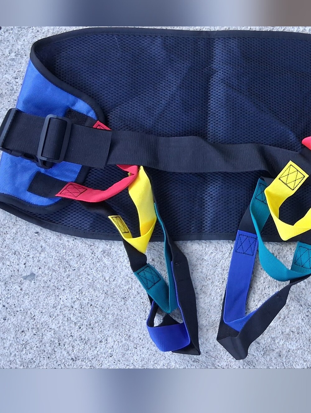 Invacare Reliant toileting sling with a safety belt, model R121